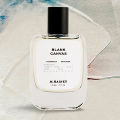 M. Hailey Blank Canvas fragrance bottle on a textured surface